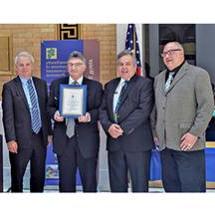 BWSC's Executive Director and Chief Engineer receiving the STAR L award from Mass DEP